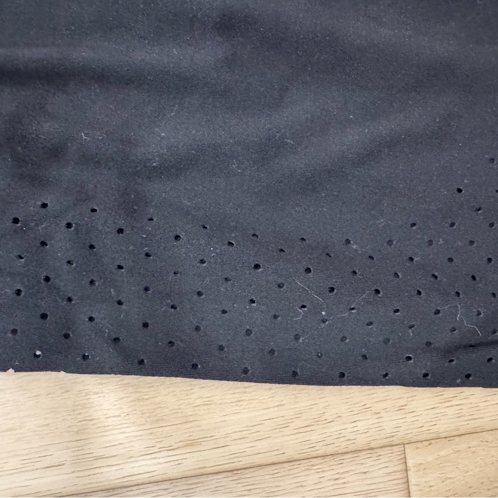 Athleta 7/8 Crop Black Laser cut leggings size 8